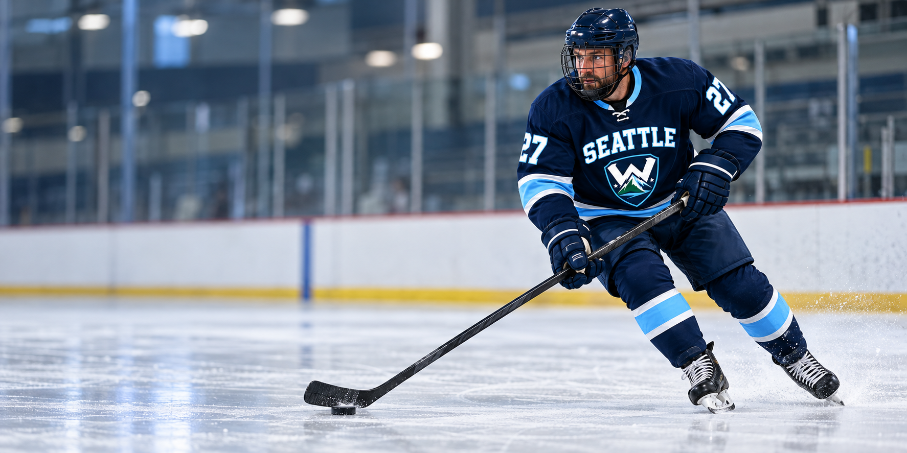 Illustrative action photo of a hockey player skating in the approved navy Seattle Warriors uniform.